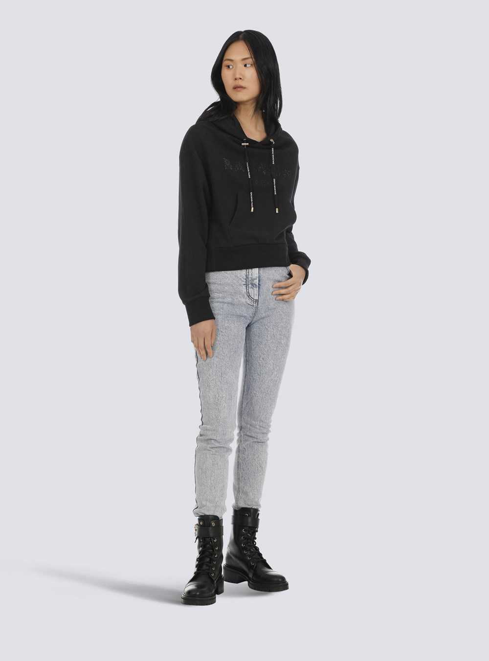 Balmain Cropped Eco-designed Cotton Sweatshirt With Rhinestone Balmain Logo Black | JWALROM-65