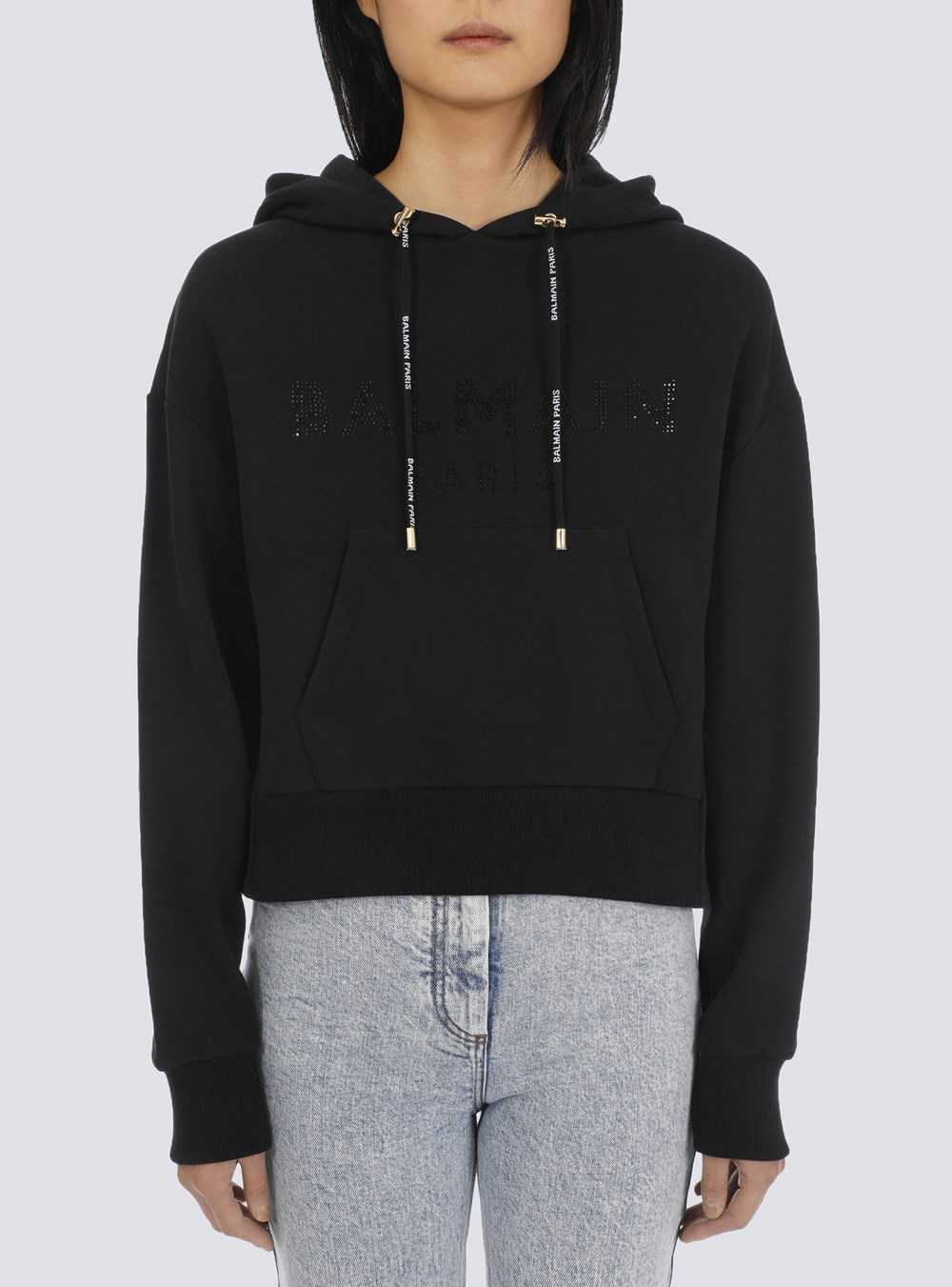 Balmain Cropped Eco-designed Cotton Sweatshirt With Rhinestone Balmain Logo Black | JWALROM-65