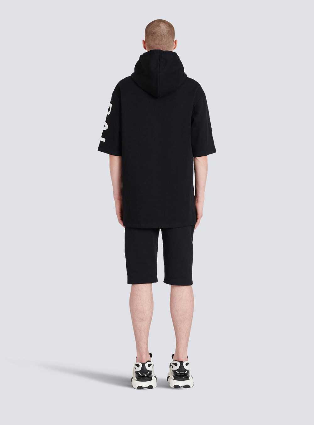 Balmain Oversized Eco-designed Cotton Hooded Sweatshirt With Balmain Logo Print Black | VCPMTIG-54