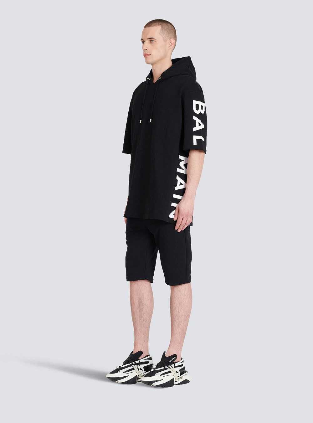 Balmain Oversized Eco-designed Cotton Hooded Sweatshirt With Balmain Logo Print Black | VCPMTIG-54