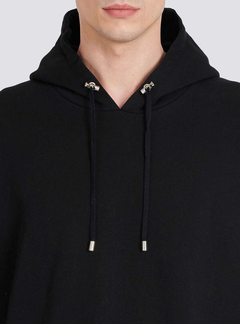 Balmain Oversized Eco-designed Cotton Hooded Sweatshirt With Balmain Logo Print Black | VCPMTIG-54